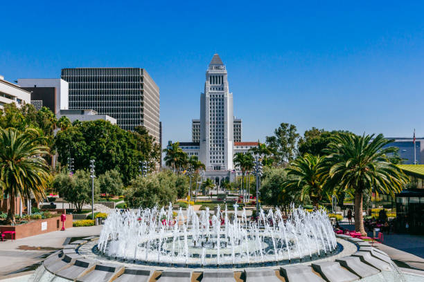 Fountain in Grand Park, and Los Angeles City Hall stock photo