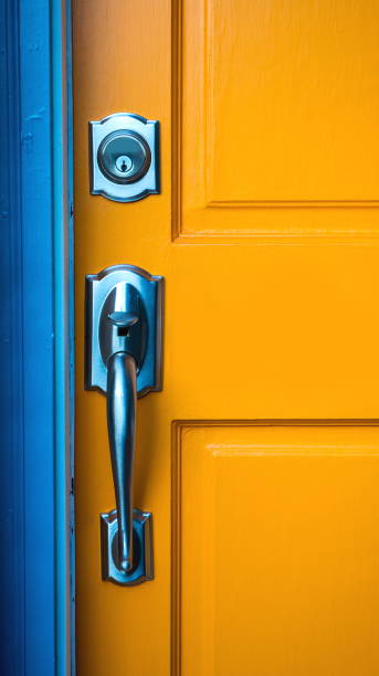istock Door handle with a lock on wooden door 1049576276