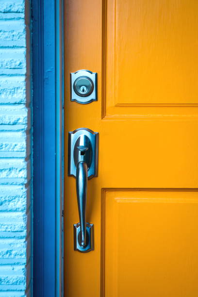Door handle with a lock on wooden door
