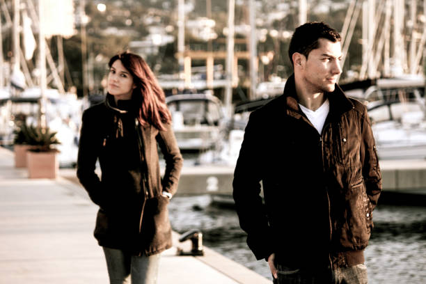 istock Young couple in love in the harbor 1049576688