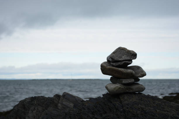 istock Inukshuk on the shore 1049579238