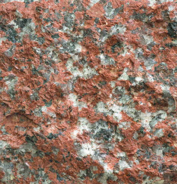 istock texture of  red granite stone wall 1049589258