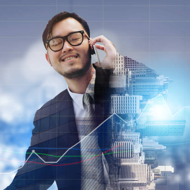 istock Double exposure businessman using mobile phone. 1049589834