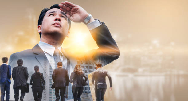 istock Double exposure - Business Leader and Team. 1049589902