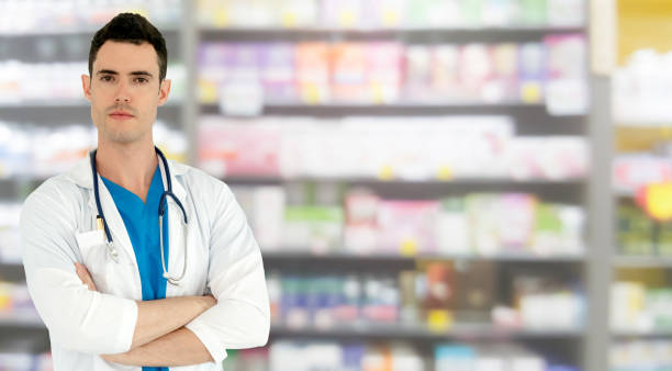 istock Male pharmacist working at the pharmacy. 1049592374