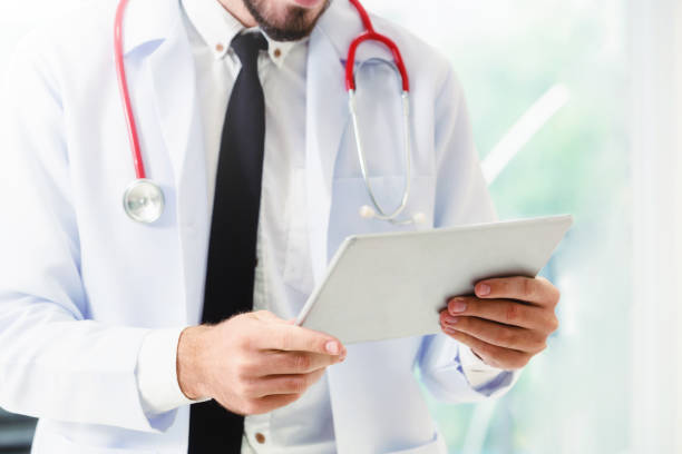 istock Doctor working on tablet computer in the hospital. 1049601758
