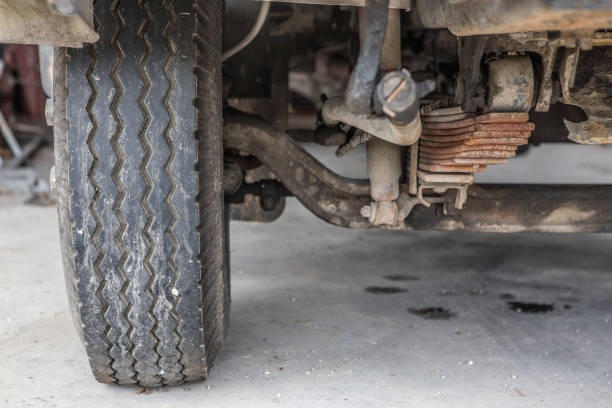 istock Wheel and Truck Suspension background 1049601906