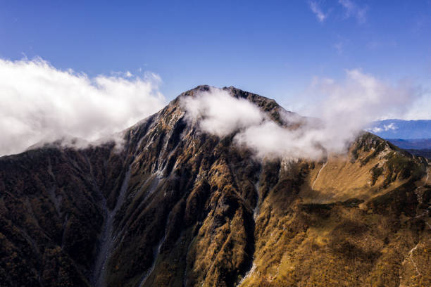 Aerial drone photo - Mt. Kita, Southern Japanese Alps.  Japan A beautiful drone photo of Mt. Kita, the tallest mountain in the Southern Japanese Alps.  Japan akaishi mountains stock pictures, royalty-free photos & images