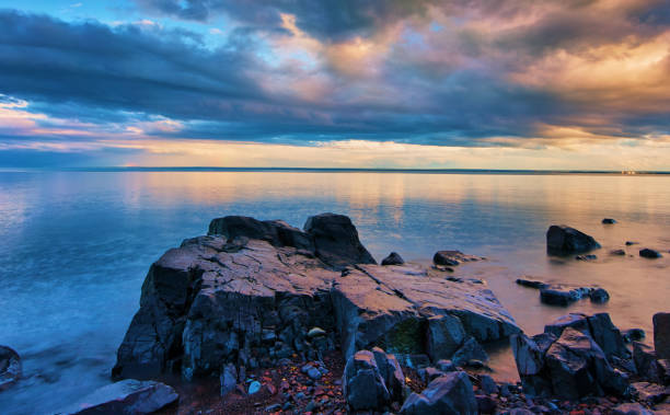 istock Beautiful Clouds over Lake Superior with reflection 1049621476