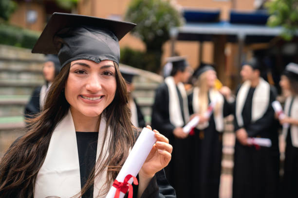 istock Happy female student celebrating her graduation 1049624052
