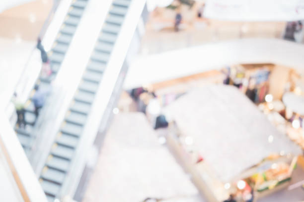 istock abstract shopping mall store blurred on background 1049629312