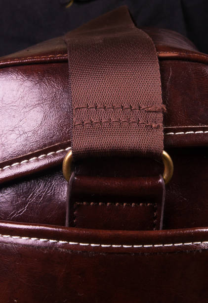 istock fittings on the leather hand bag, close up 1049631688