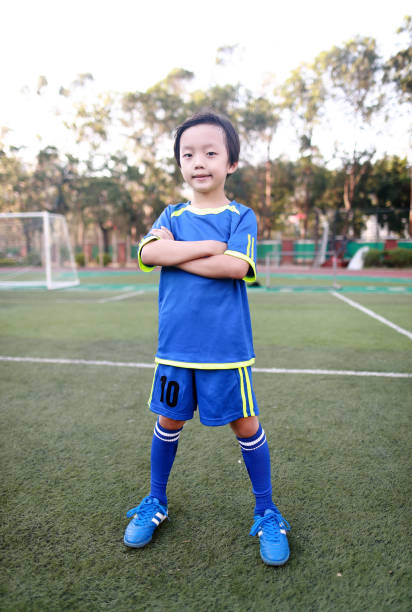istock Boy with soccer ball 1049655766