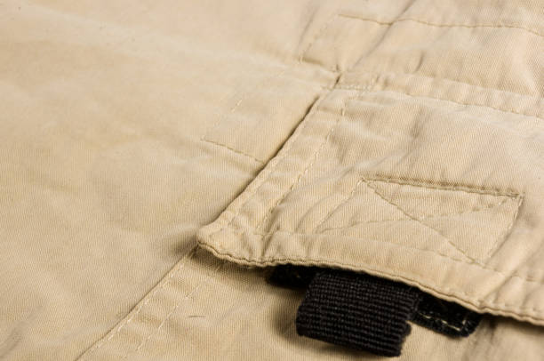 istock clothing items washed cotton fabric texture with seams 1049656202