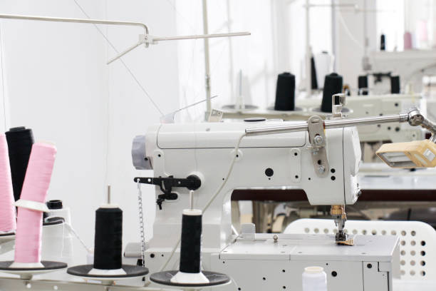 istock a row of sewing machine in tailor workplace 1049658814