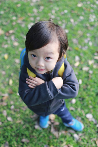 istock Cute children playing in the park 1049664658