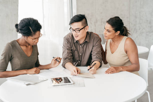 istock Couple and financial advisor 1049667610