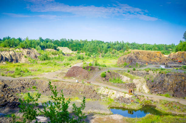 istock Quarry for the extraction of basalt stone. 1049673510