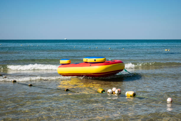istock Sea inflatable attractions. Vacation and active rest 1049676426