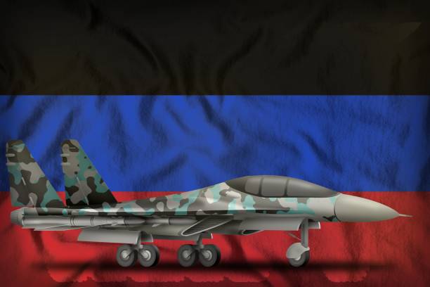 istock fighter, interceptor with winter camouflage on the Donetsk Peoples Republic state flag background. 3d Illustration 1049676866
