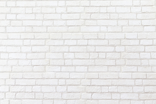 Textured grunge background red brick wall with white painted color old