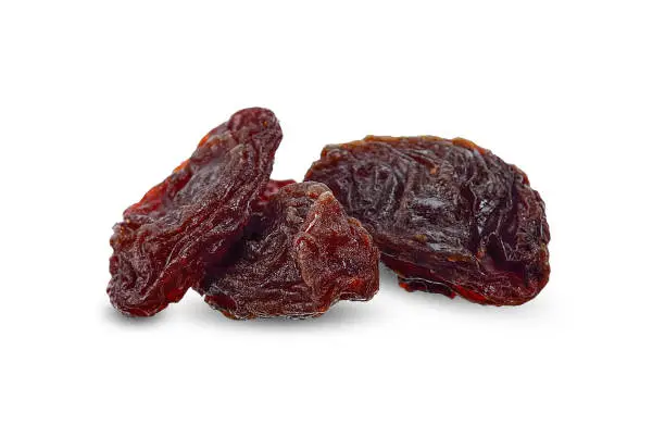 Dried raisins isolated on white clipping path.