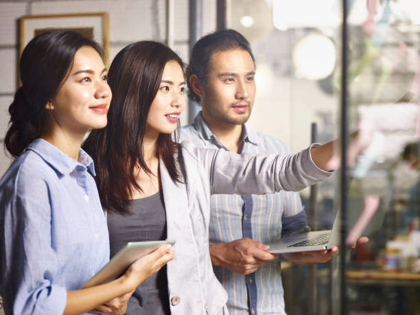 istock young asian corporate executives working together in office 1049682562