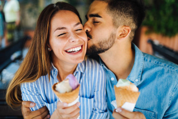 istock Happy couple having date and eating ice cream 1049688514