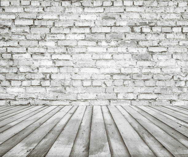 istock old white room with brick wall, vintage background 1049700710