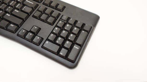istock black keyboard of a modern computer on white background 1049701194