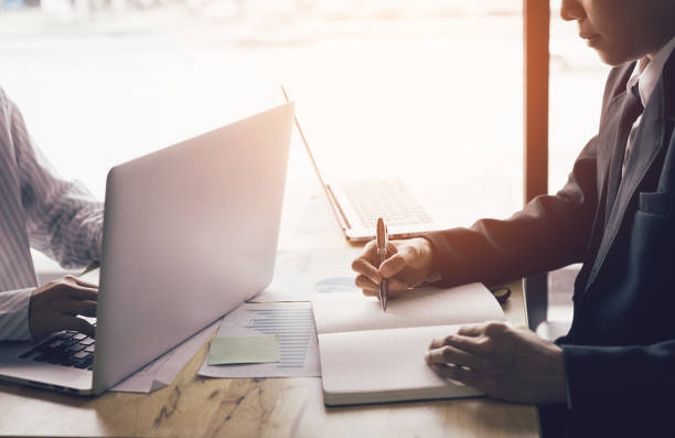 istock Business people working on desk together. 1049701634