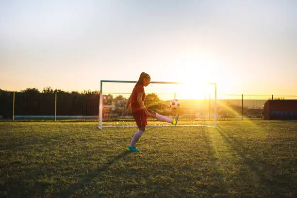 Women's soccer player on training.