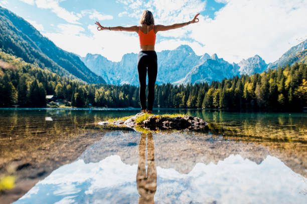 istock Yogi woman meditating in nature 1049704984