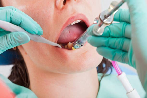 istock Local anesthesia before dental procedure 1049705190