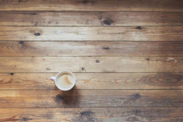 istock cup of coffee on a wooden table. 1049708492