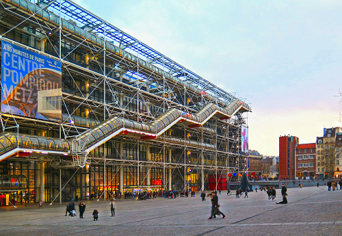 Modern architecture and building, museum center Pompidou with abstract patterns and people on the square, Paris France