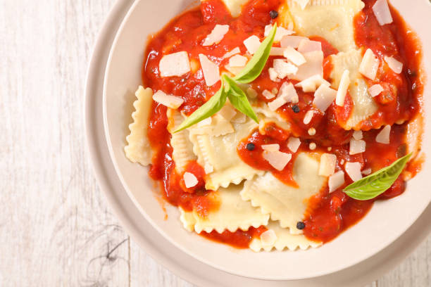 istock ravioli and tomato sauce 1049717798