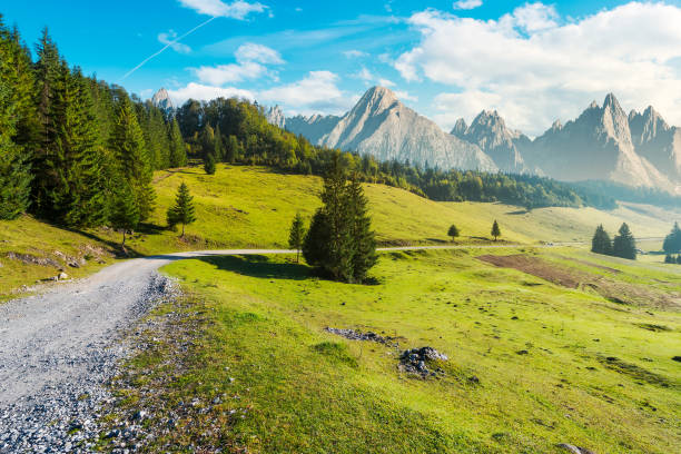 istock country road winds through the valley 1049720414