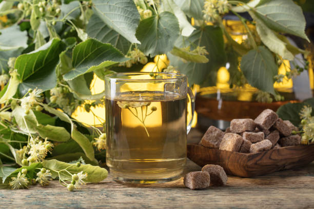 istock Glass of linden tea with brown sugar . 1049725754