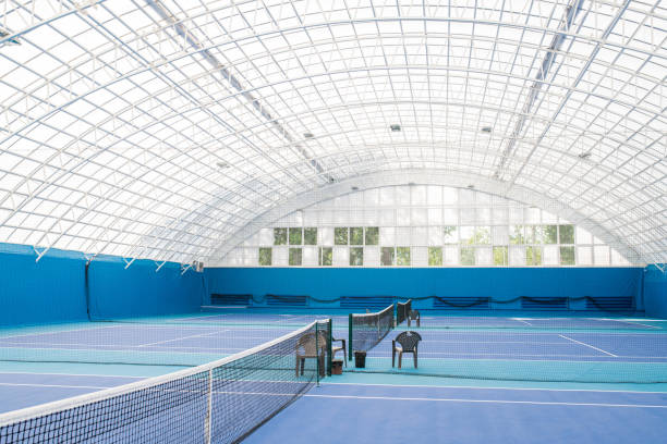 istock Indoor Tennis Court 1049727980