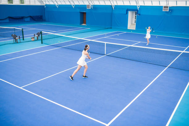 istock Tennis Match in Court 1049728270