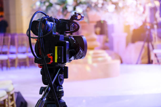 istock Video camera recording at television broadcast events 1049729490
