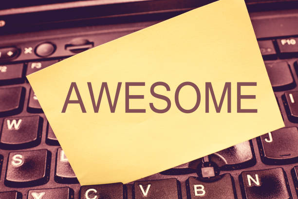 istock Handwriting text writing Awesome. Concept meaning Something spectacular amazing fantastic extremely impressive good 1049732822