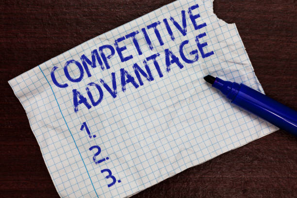 istock Writing note showing Competitive Advantage. Business photo showcasing Company Edge over another Favorable Business Position Squared notebook paper Markers Communicating ideas Expressing feelings. 1049733066