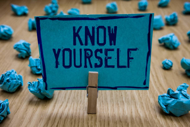 istock Handwriting text writing Know Yourself. Concept meaning Find You Understanding Strength and Weaknesses Identity Clothespin holding blue paper note crumpled papers several tries mistakes. 1049736044