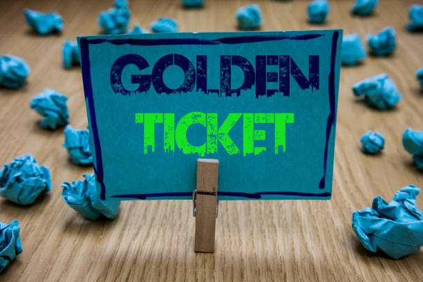 istock Handwriting text writing Golden Ticket. Concept meaning Rain Check Access VIP Passport Box Office Seat Event Clothespin holding blue paper note crumpled papers several tries mistakes. 1049736104