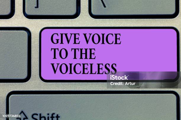 Writing Note Showing Give Voice To The Voiceless Business Photo Showcasing Speak Out On Behalf Defend The Vulnerable Stock Photo - Download Image Now