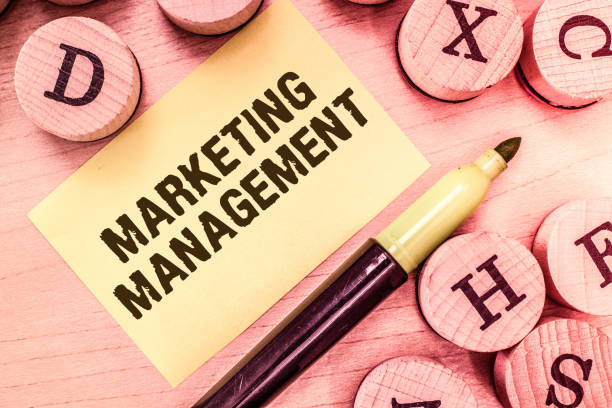 istock Handwriting text writing Marketing Management. Concept meaning Develop Advertise Promote a new Product or Service 1049737024