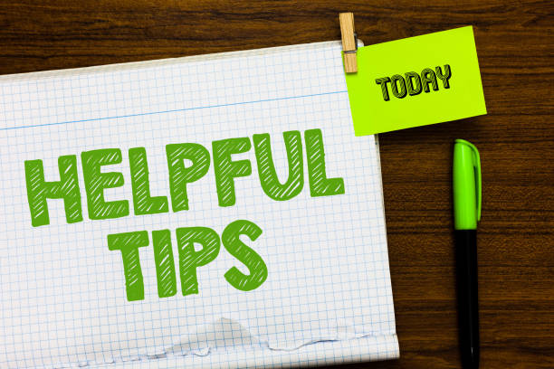 istock Writing note showing Helpful Tip s is. Business photo showcasing Ask an Expert Solutions Hints Consulting Warning Open notebook page markers holding paper heart wooden background. 1049737082