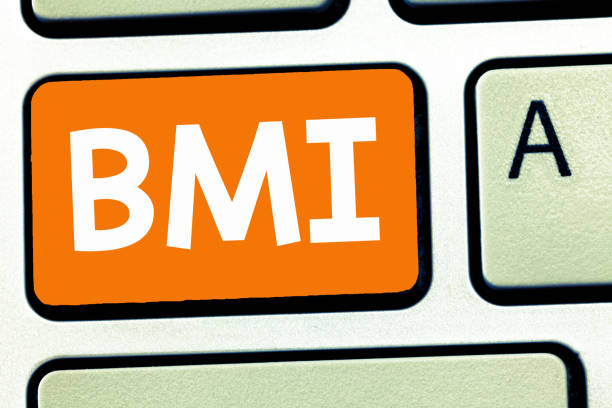 istock Handwriting text writing Bmi. Concept meaning Method of estimating body fat levels based on weight and height 1049738442